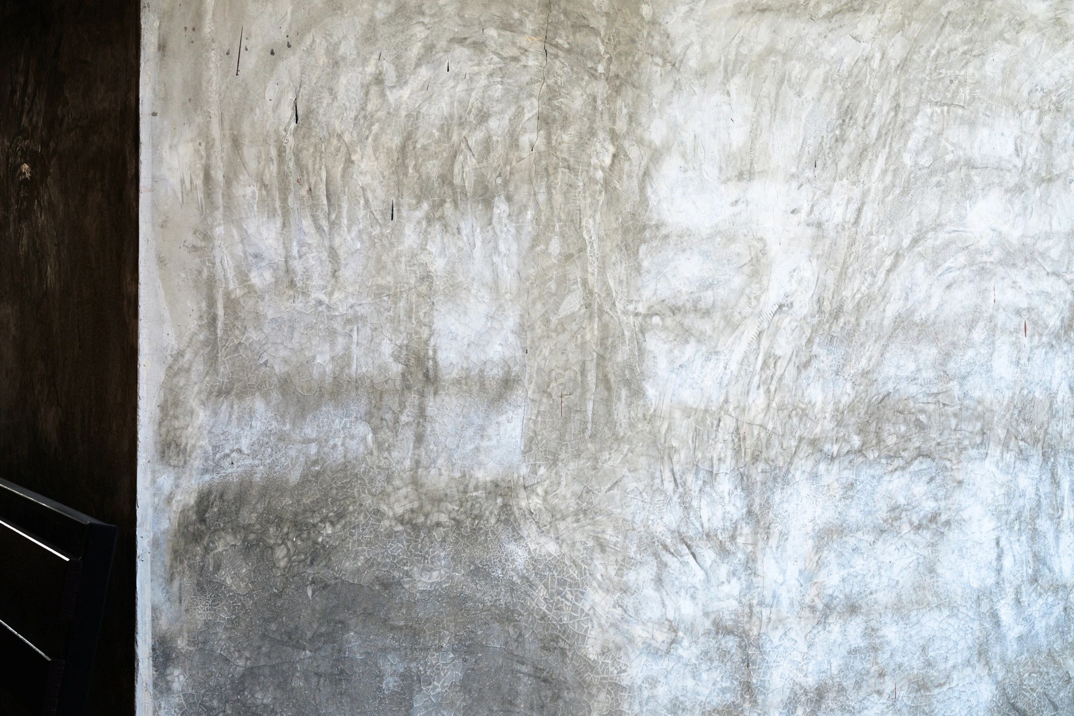 Concrete wall surface representing construction documentation and planning